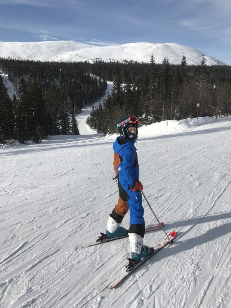 Trysil in Norway - a person riding skis down a snowy slope.
