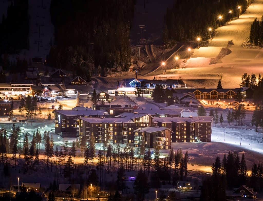 Trysil in Norway: a ski resort lit up at night.