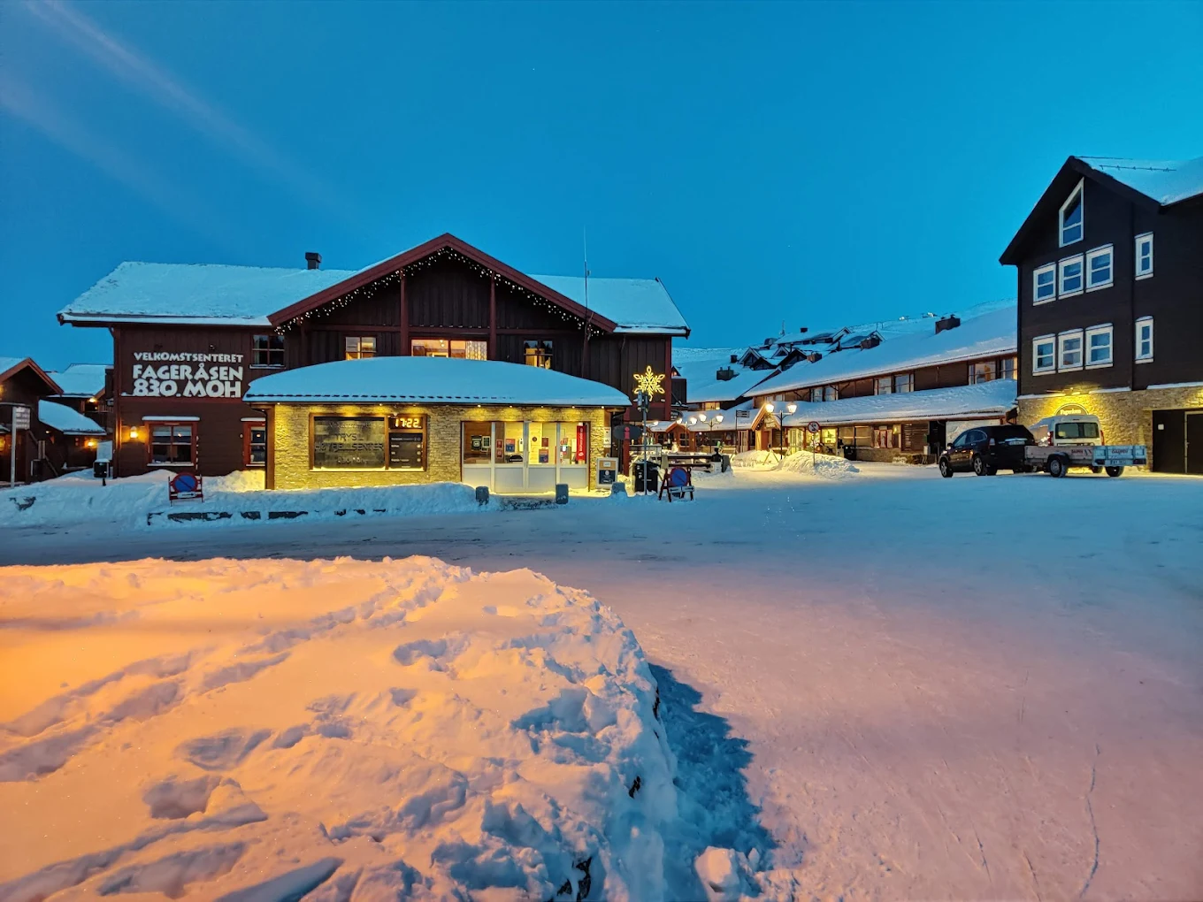 Trysil in Norway: a large building with a lot of snow on the ground.