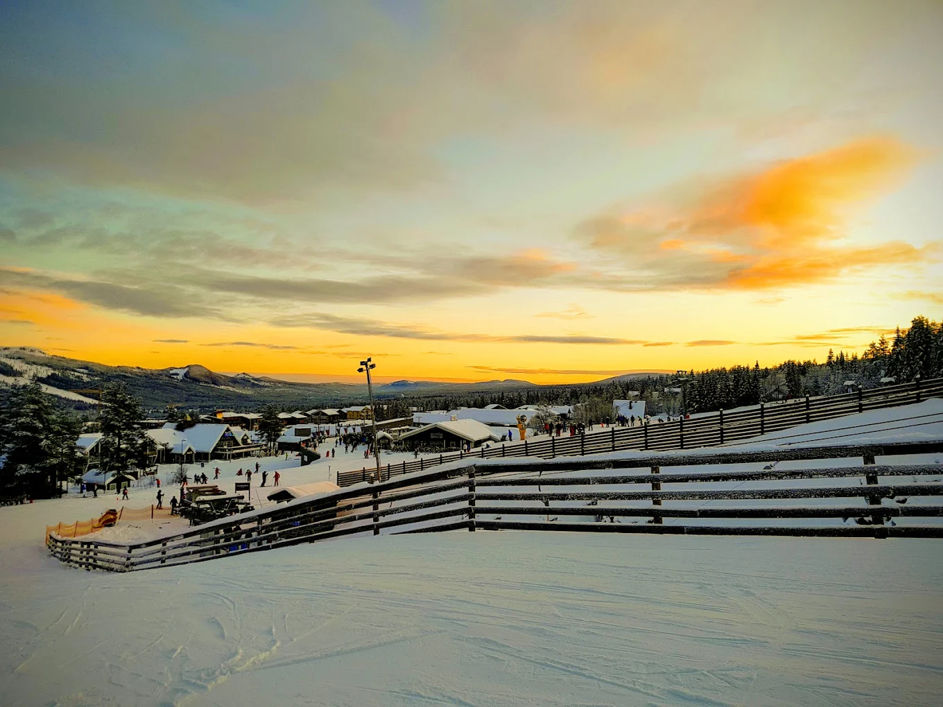 Trysil in Norway: a view of a ski resort at sunset.