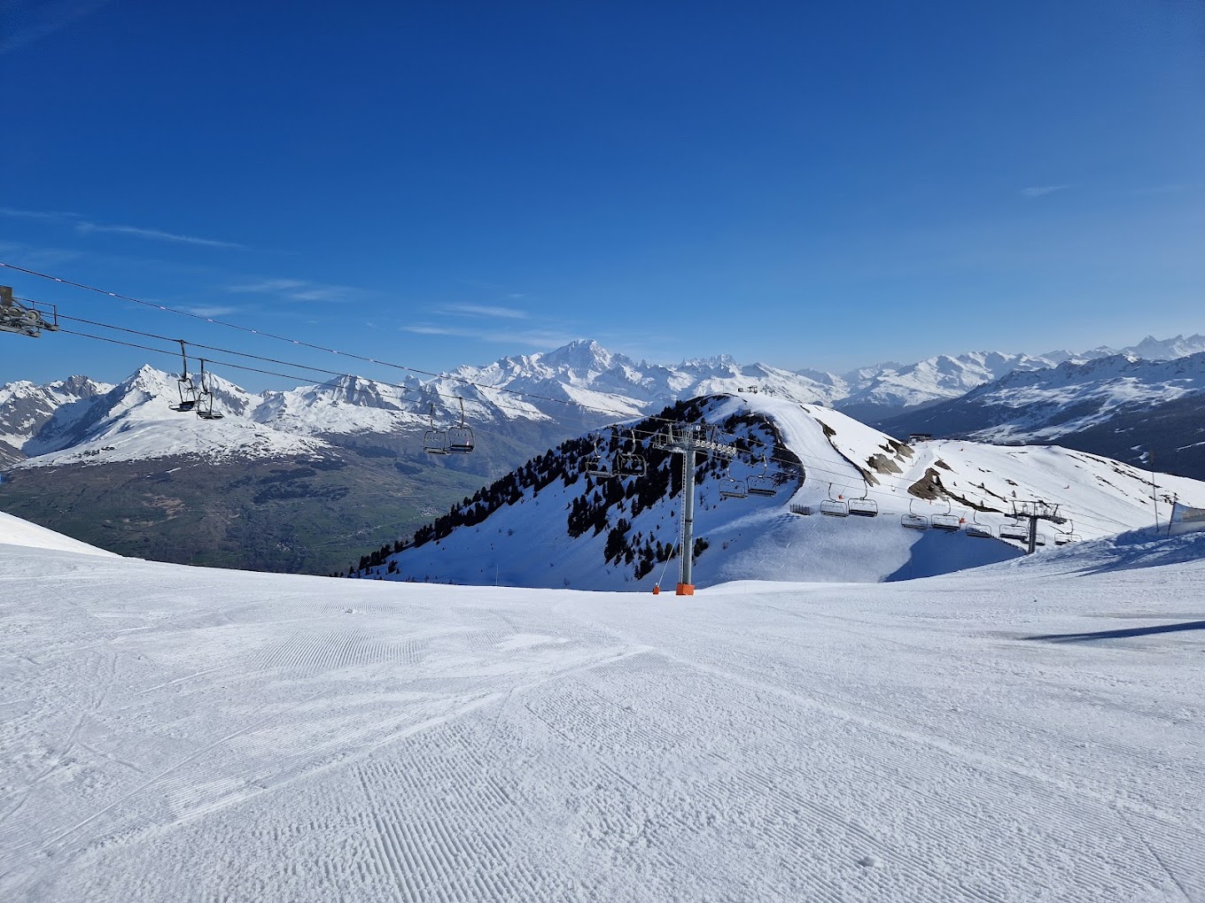 La Plagne in France - a ski slope with a ski lift in the background.