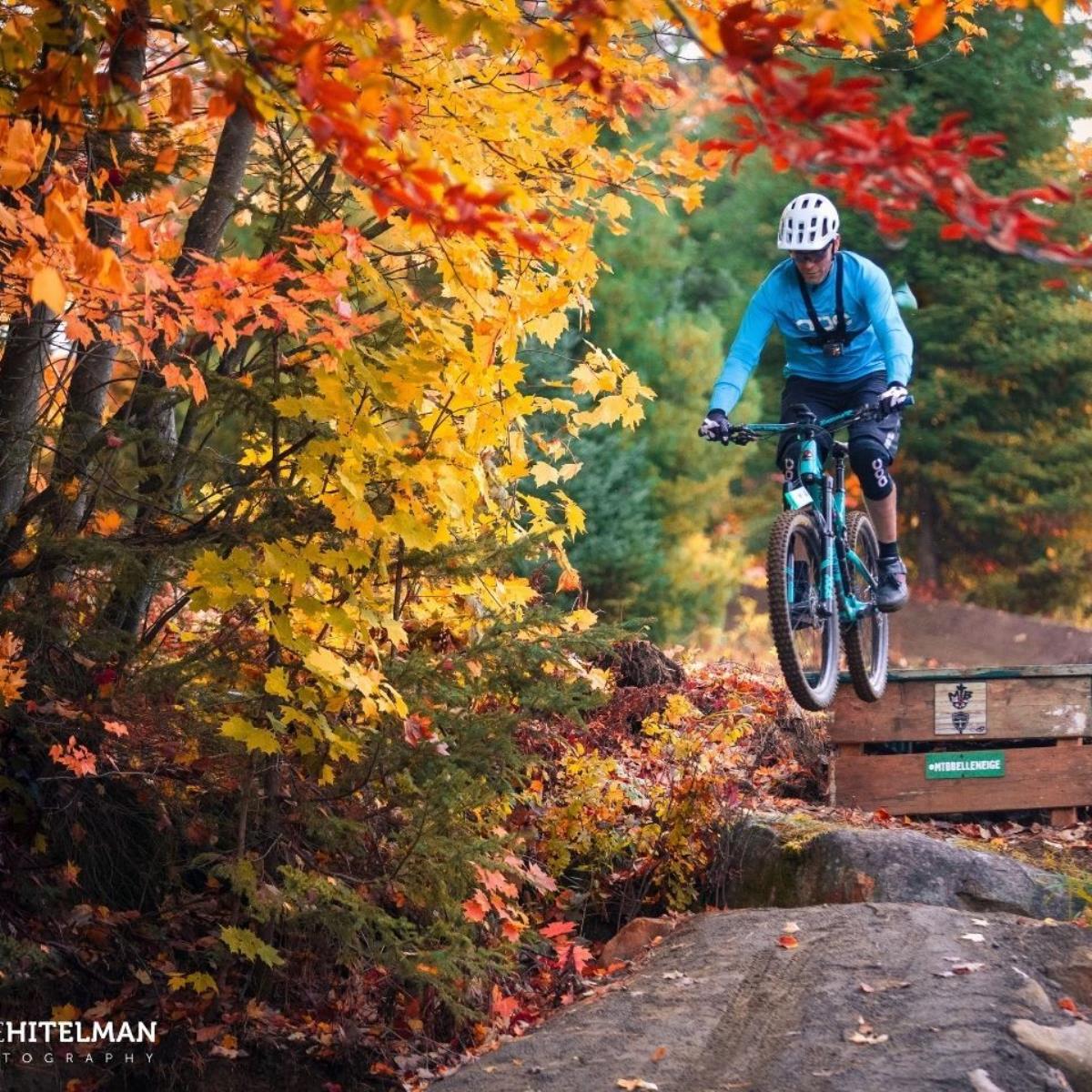 Belle Neige in Canada - a person riding a mountain bike on a trail.