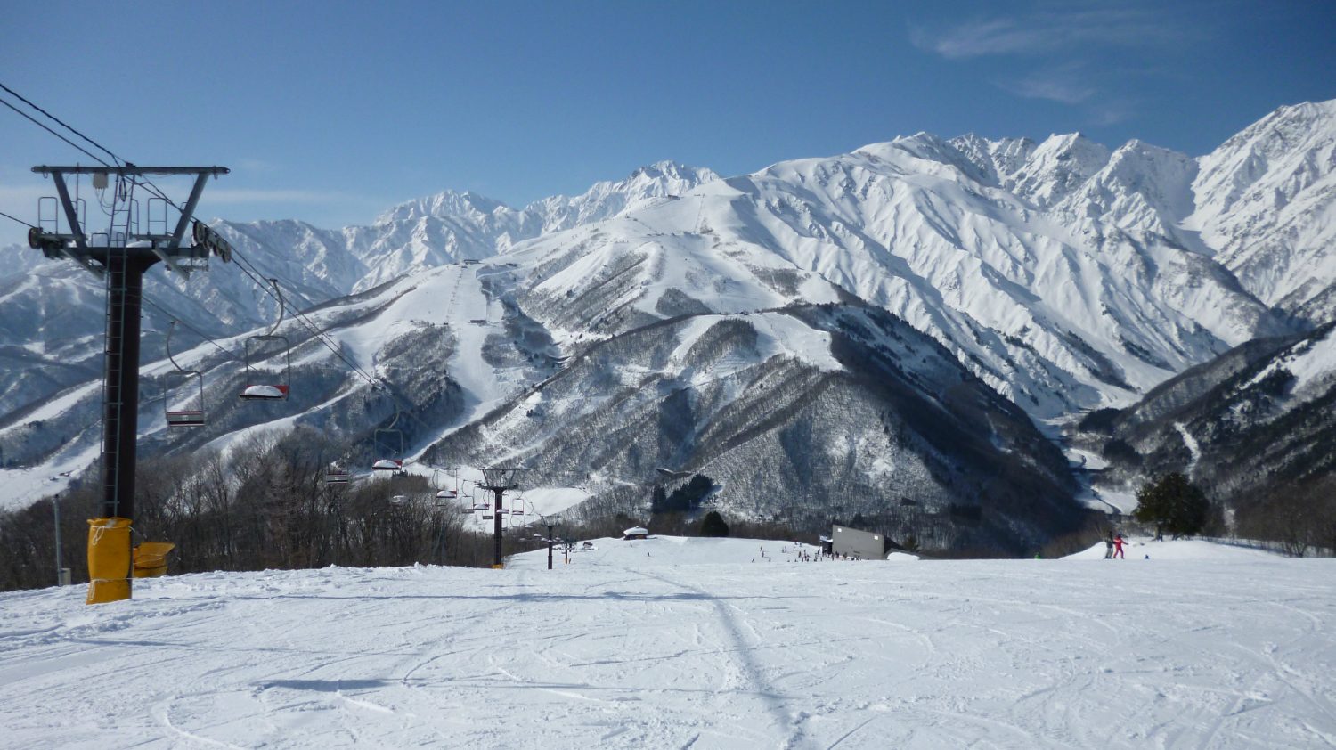 Sun Alpina Hakuba Sanosaka Snow Resort in Japan - a ski slope covered in snow.