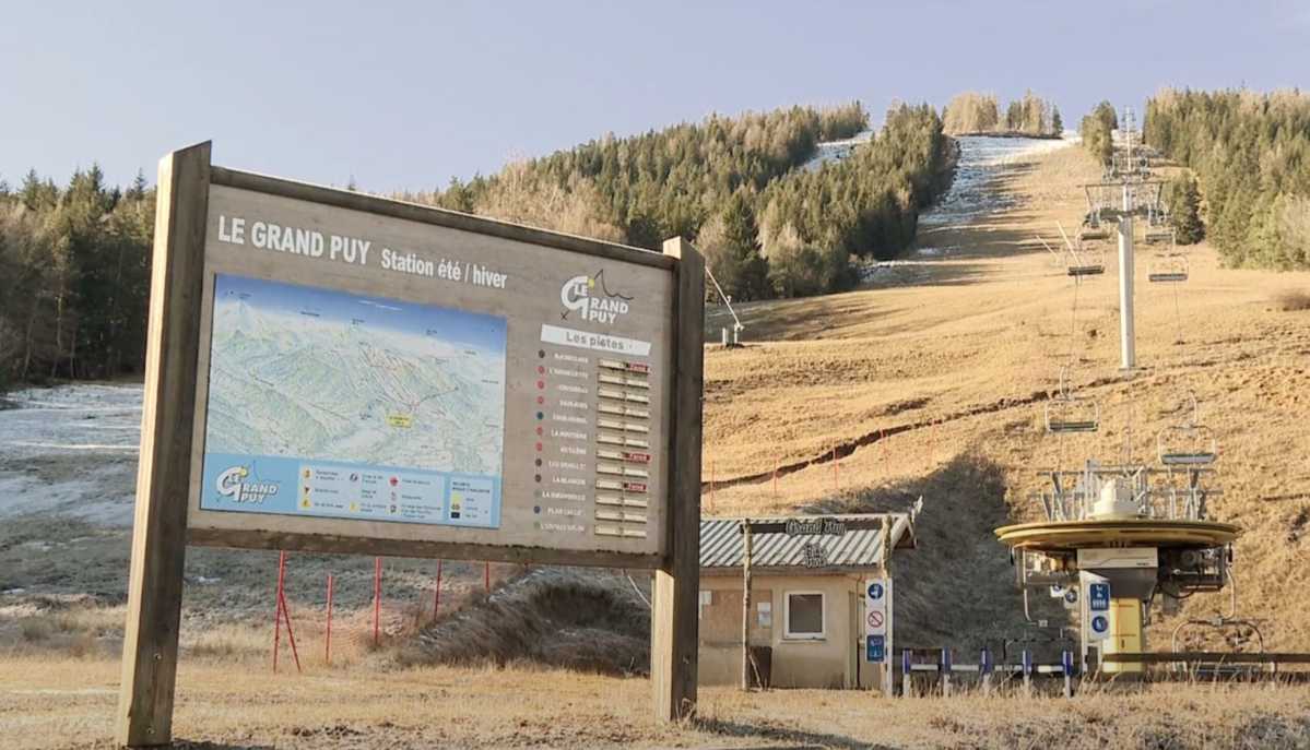 Grand Puy in France - a sign that is on the side of a hill.
