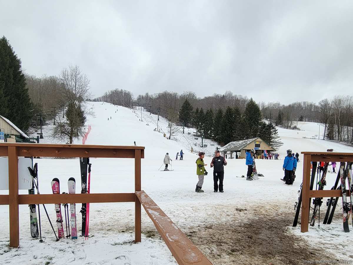 Kissing Bridge in USA - a group of people standing on a ski slope.