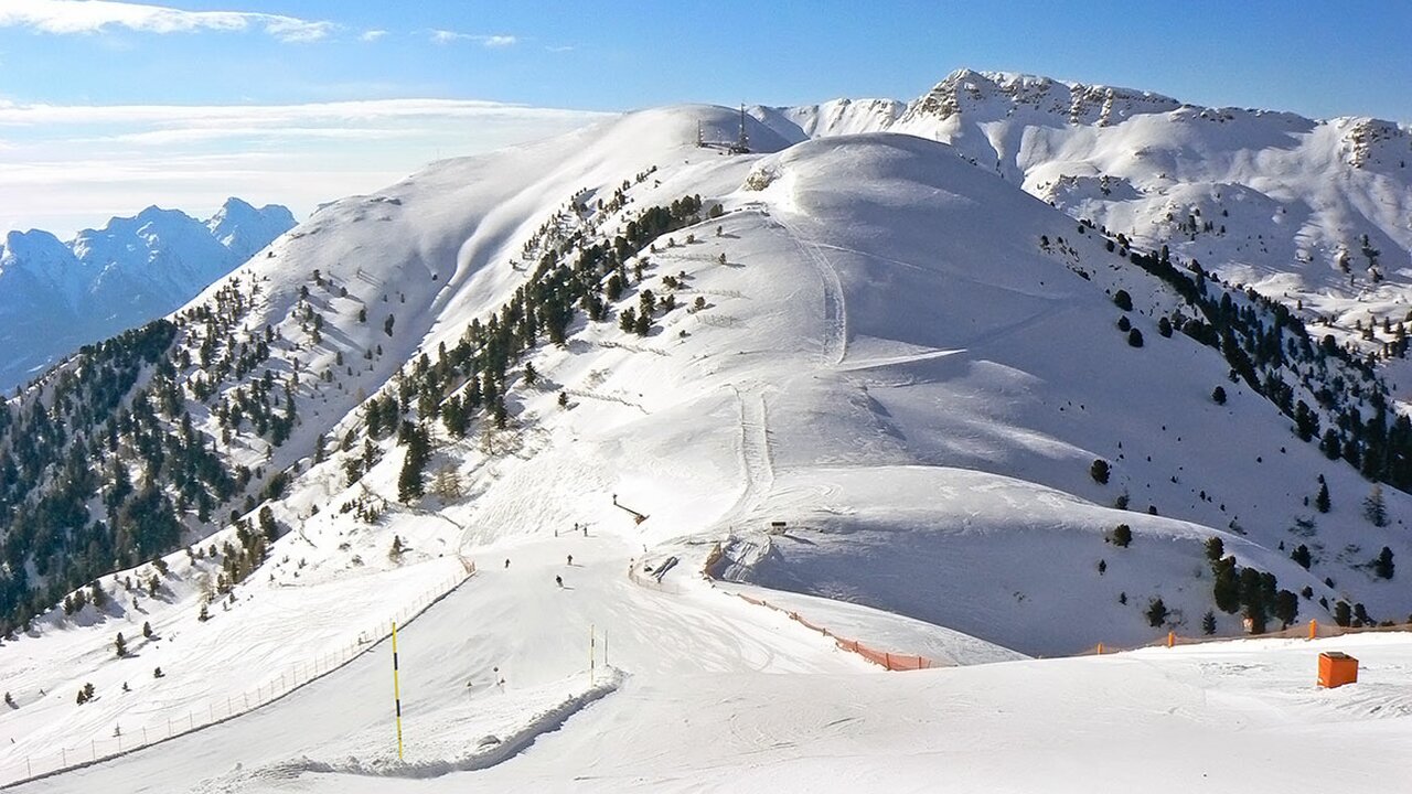 Ski Center Latemar in Italy - a view of the mountains from a ski slope.